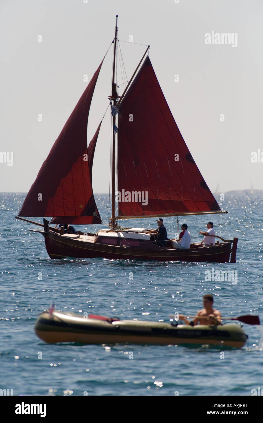 Sailboat and floating craft Stock Photo