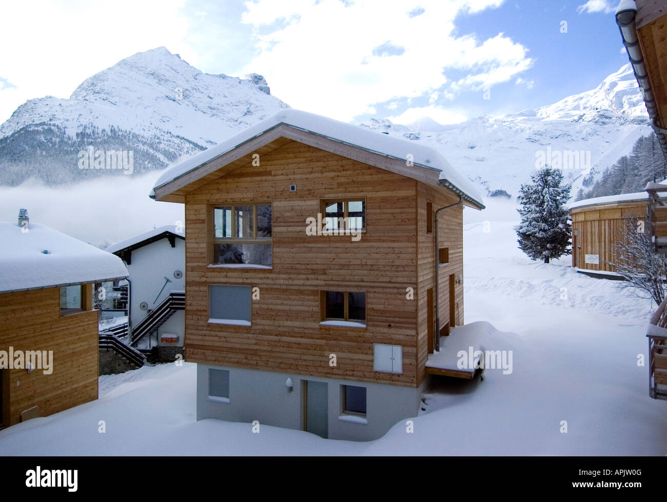 Luxury wooden chalet in the ski resort of Saas Fee in Wallis mountain range in Switzerland Stock Photo