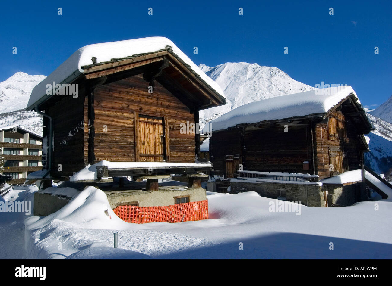Old traditional wooden barns in the ski resort of Saas Fee in Switzerland Stock Photo