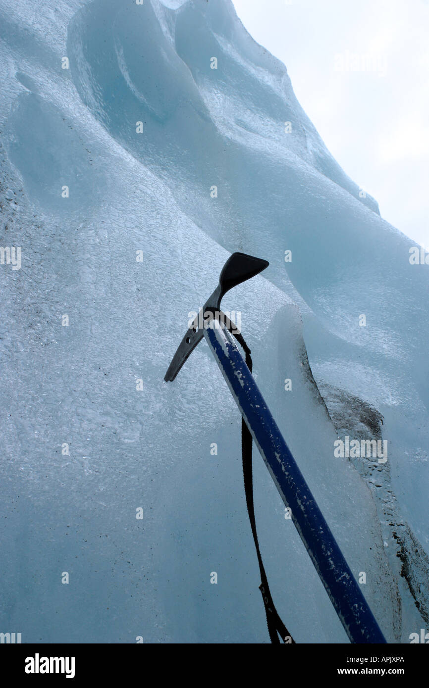 Climbing a glacier using an Ice pick Stock Photo Alamy