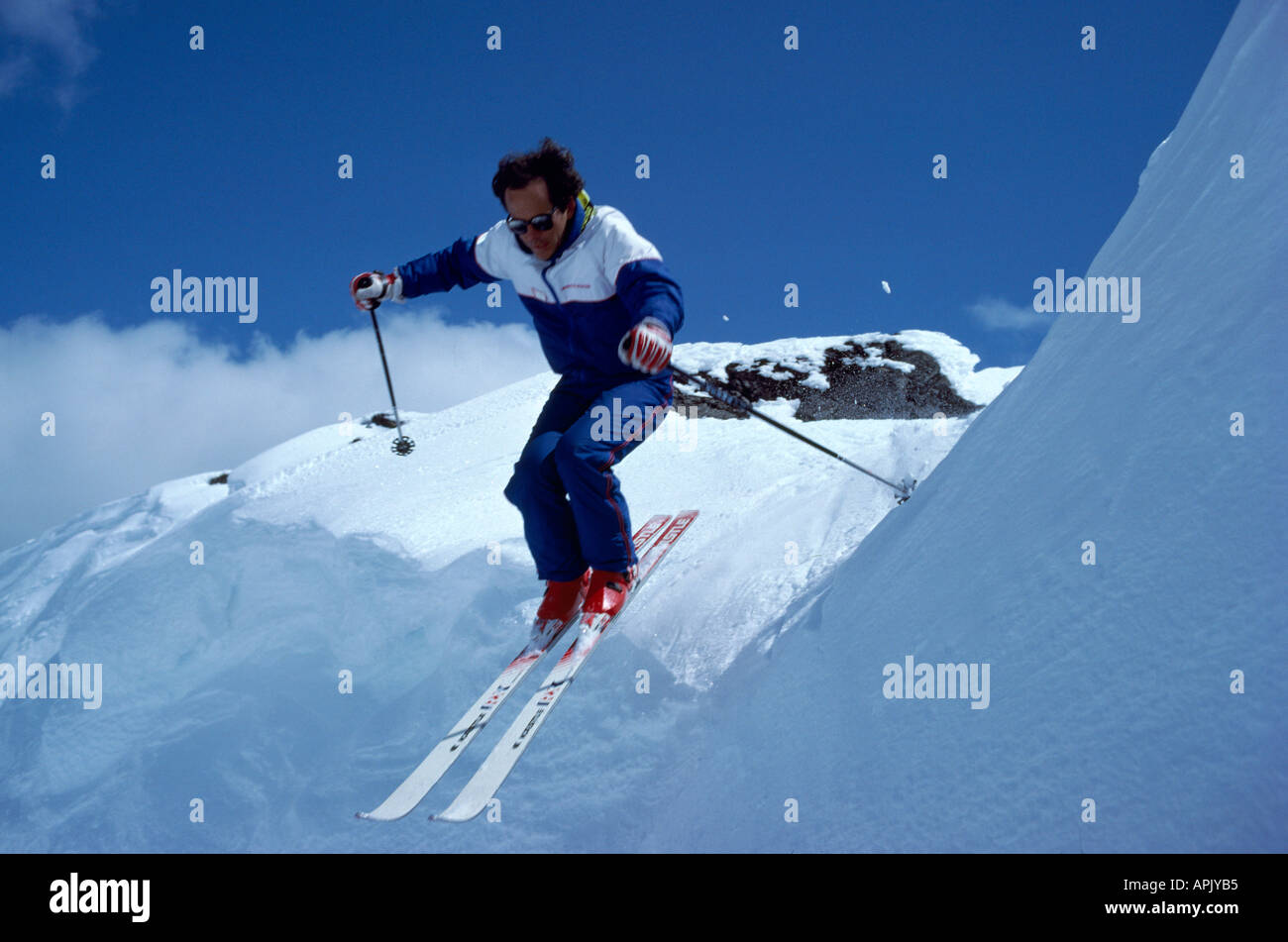 Downhill Skier skiing on Whistler Mountain, Whistler Resort, BC, British Columbia, Canada Stock Photo