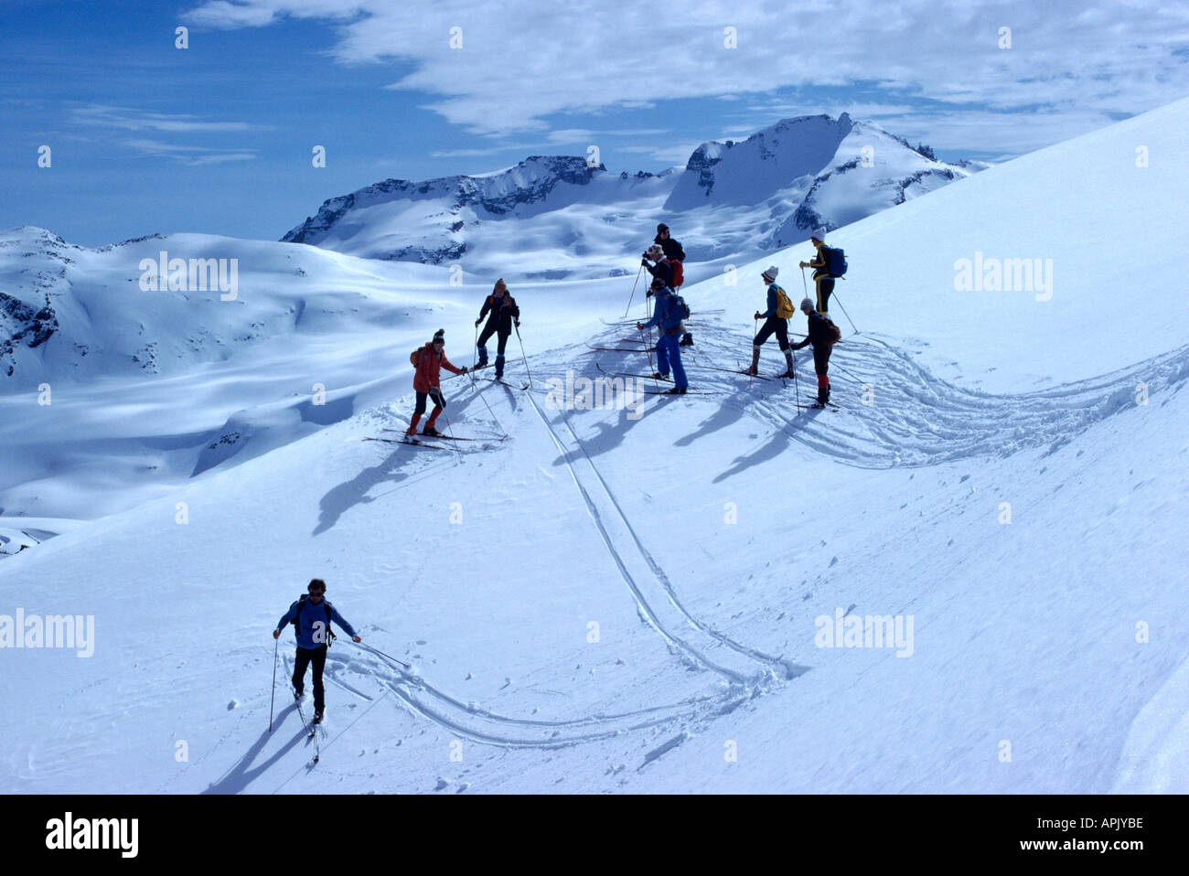 Skiers cross country skiing Downhill in Alpine Region of 'Black Tusk', near Whistler, BC, British Columbia, Canada Stock Photo