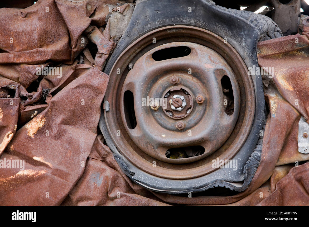 Fence of a car park in Digbeth Birmingham UK made from crushed scrap