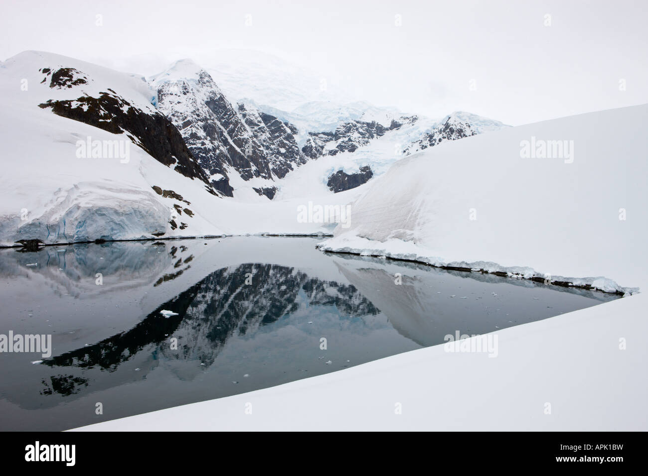 Snow covered mountains, Paradise Harbour, Antarctica Stock Photo