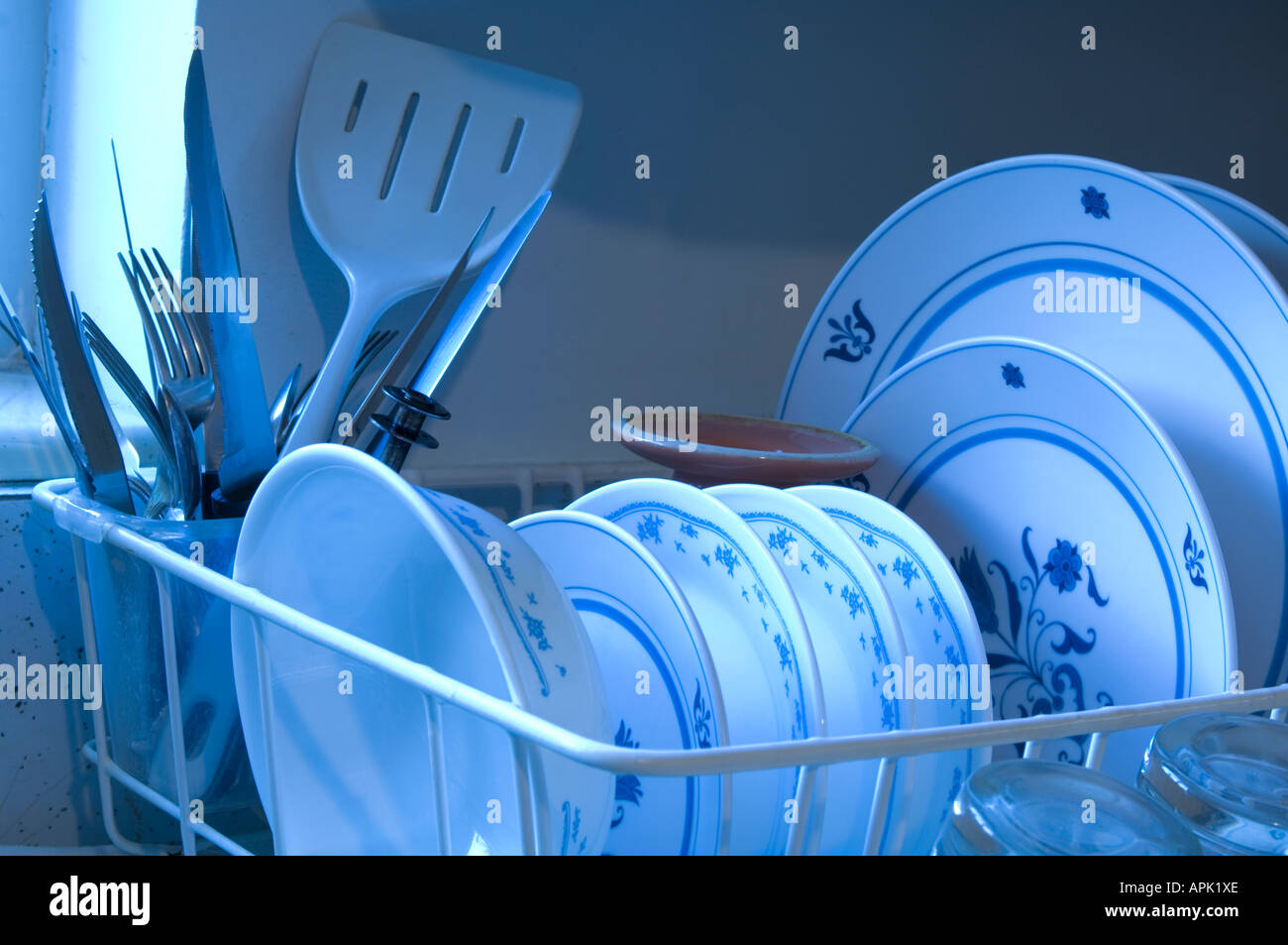 dishes drying in rack Stock Photo Alamy