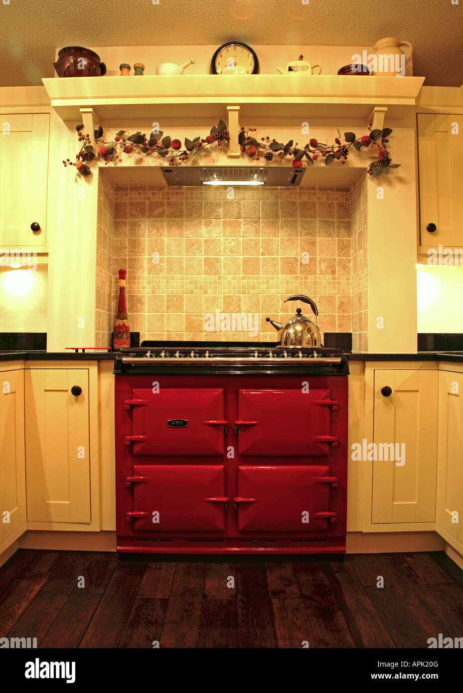 Modern red aga in tradtional kitchen Stock Photo Alamy