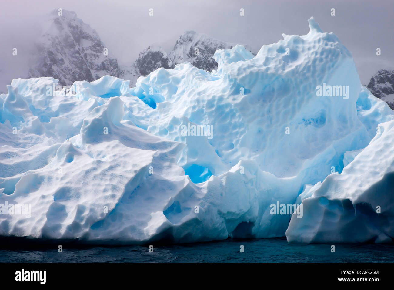 Intricate ice patterns on a melting iceberg, Antarctica Stock Photo