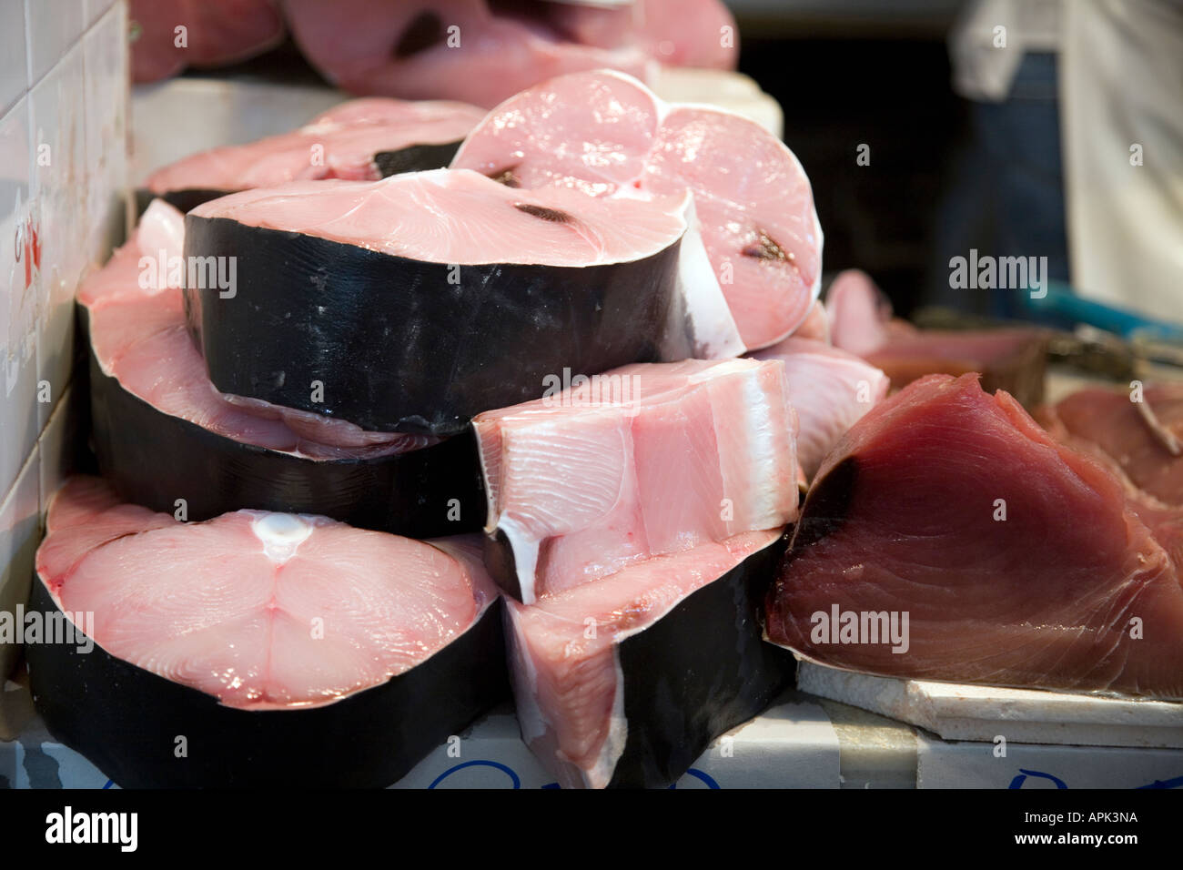Still life of fresh fish for sale on a Spanish market sliced dogfish and tuna Stock Photo
