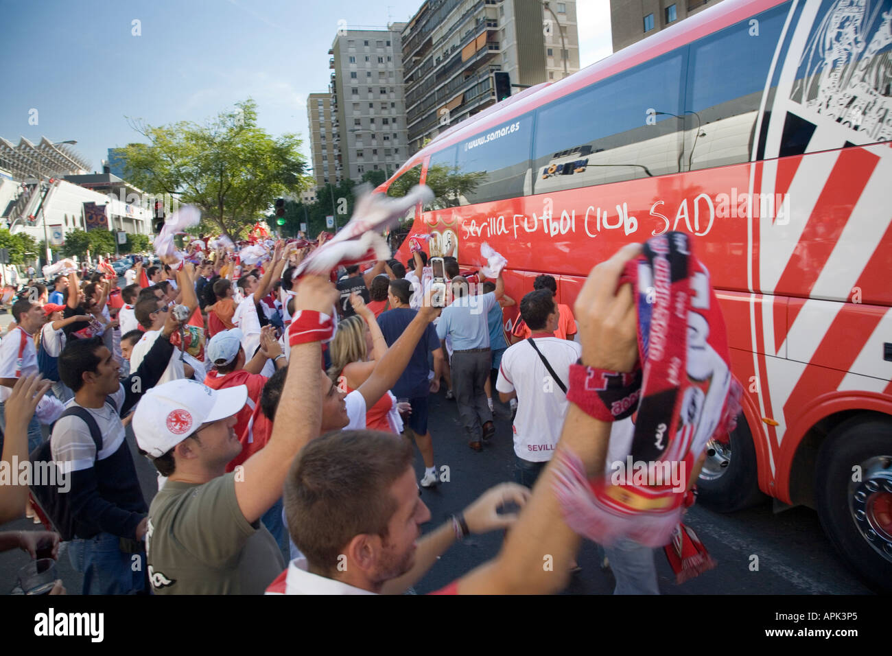 Sevilla FC fans escorting team bus in its way to stadium before a local derby against Real Betis Stock Photo