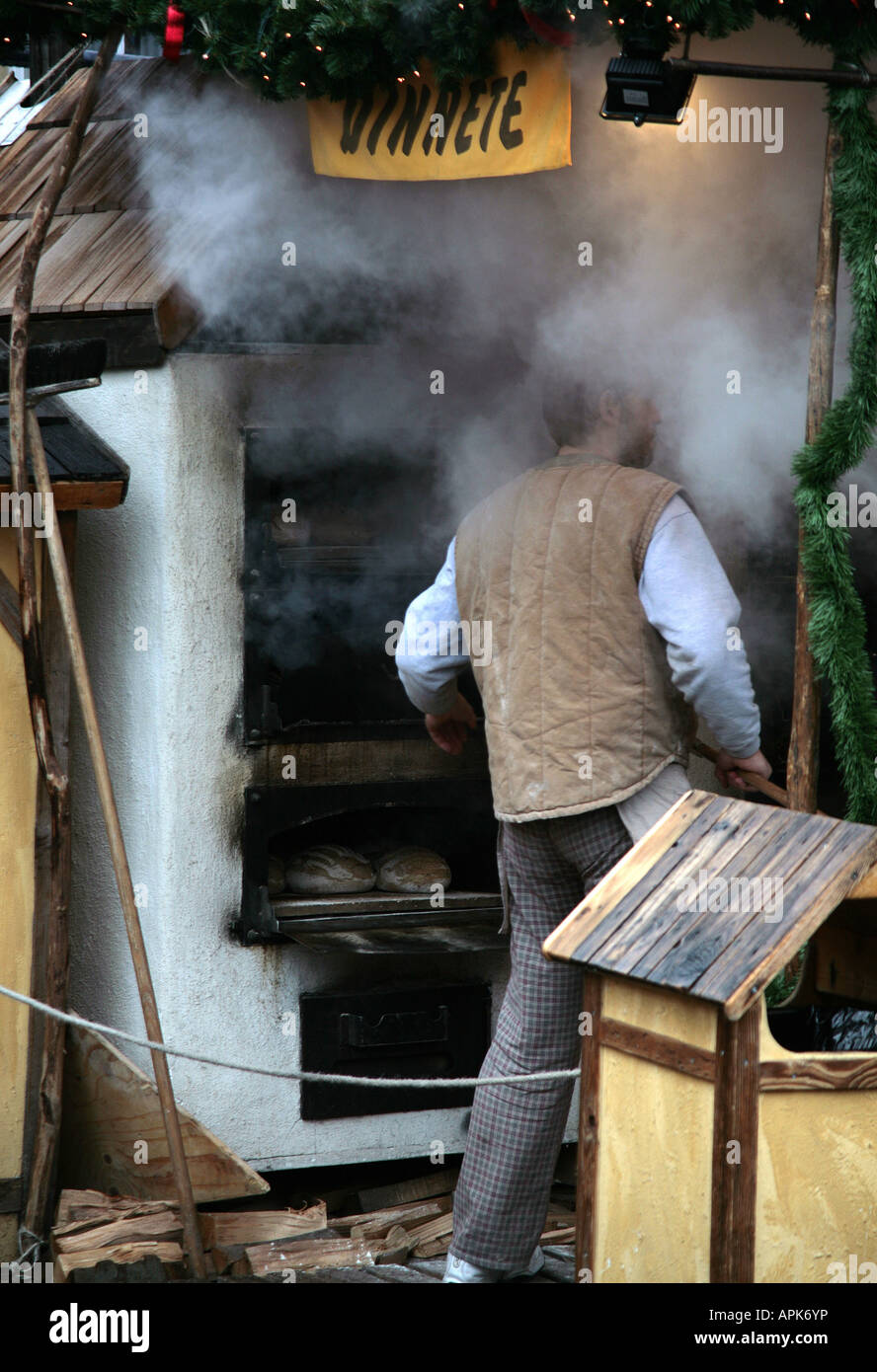 A Baker surrounded by smoke from an oven Stock Photo Alamy
