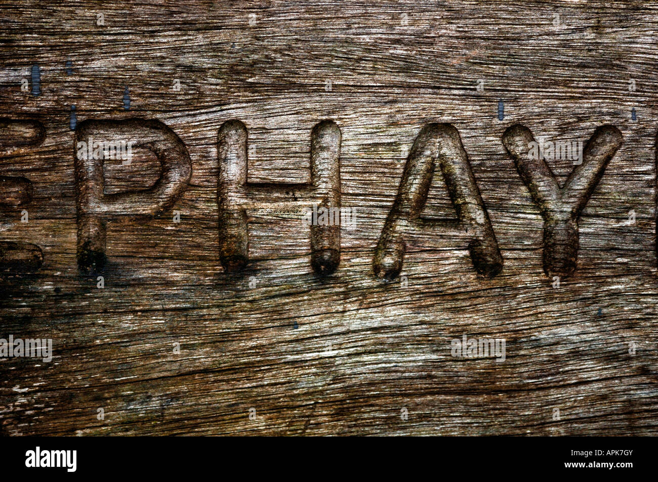 Letters Carved Into Wood Stock Photo