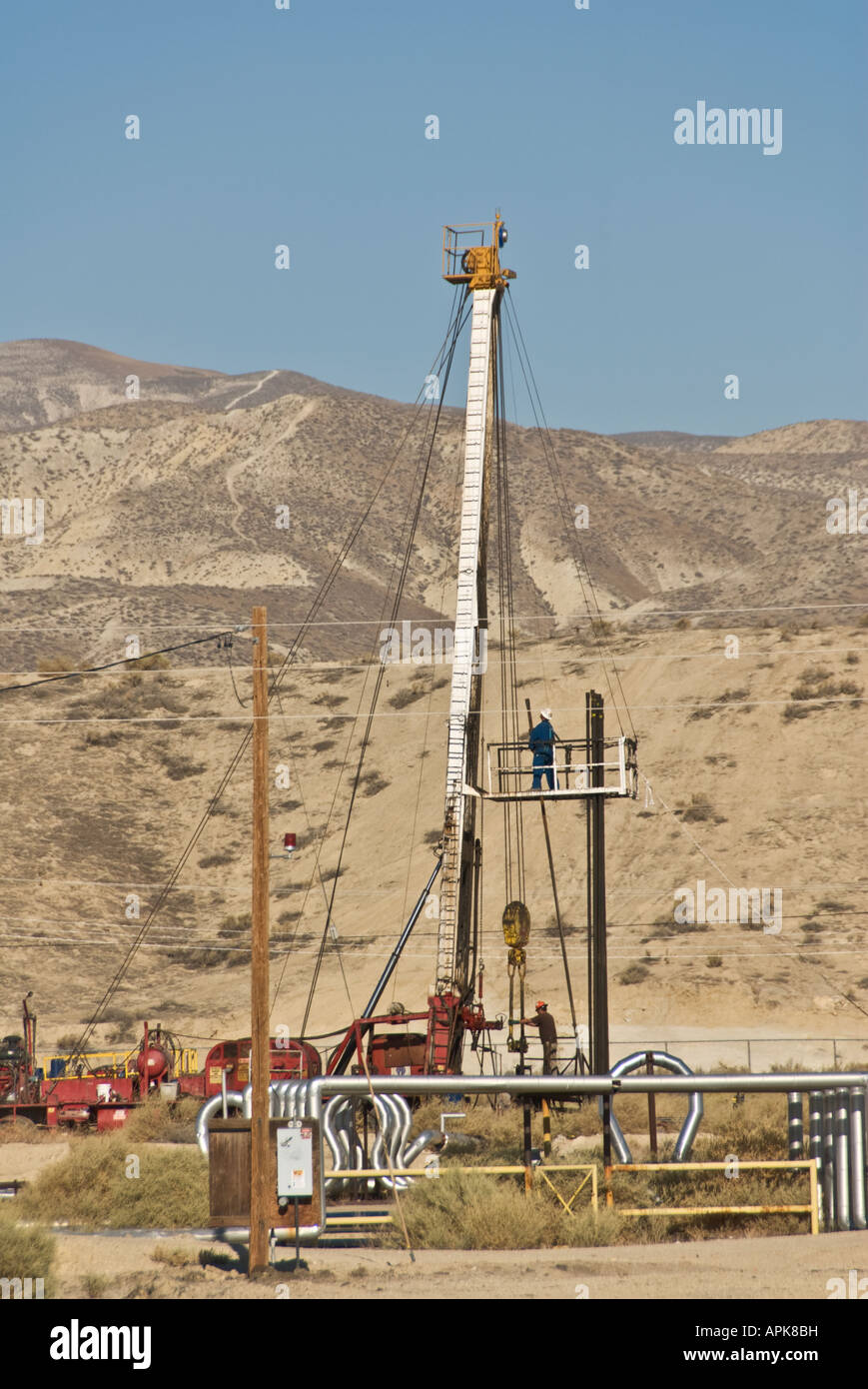 California Central Valley Kern County oil well mobile drilling rig Stock Photo