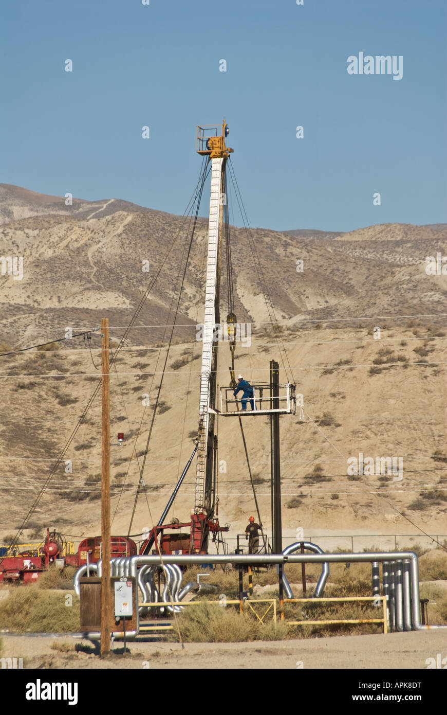 California Central Valley Kern County oil well mobile drilling rig Stock Photo