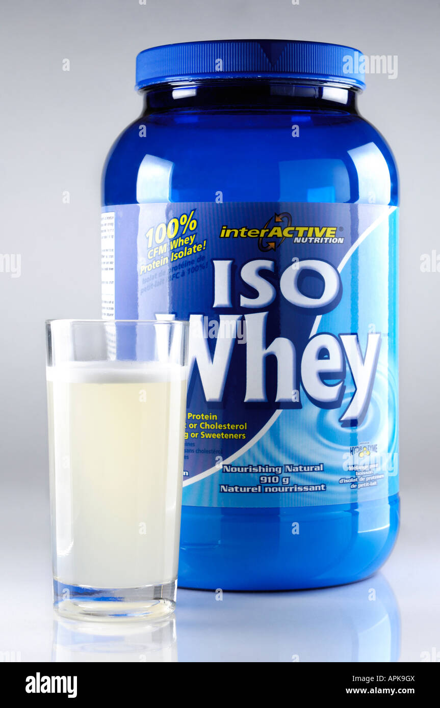 Large container and a glass of Whey protein Stock Photo