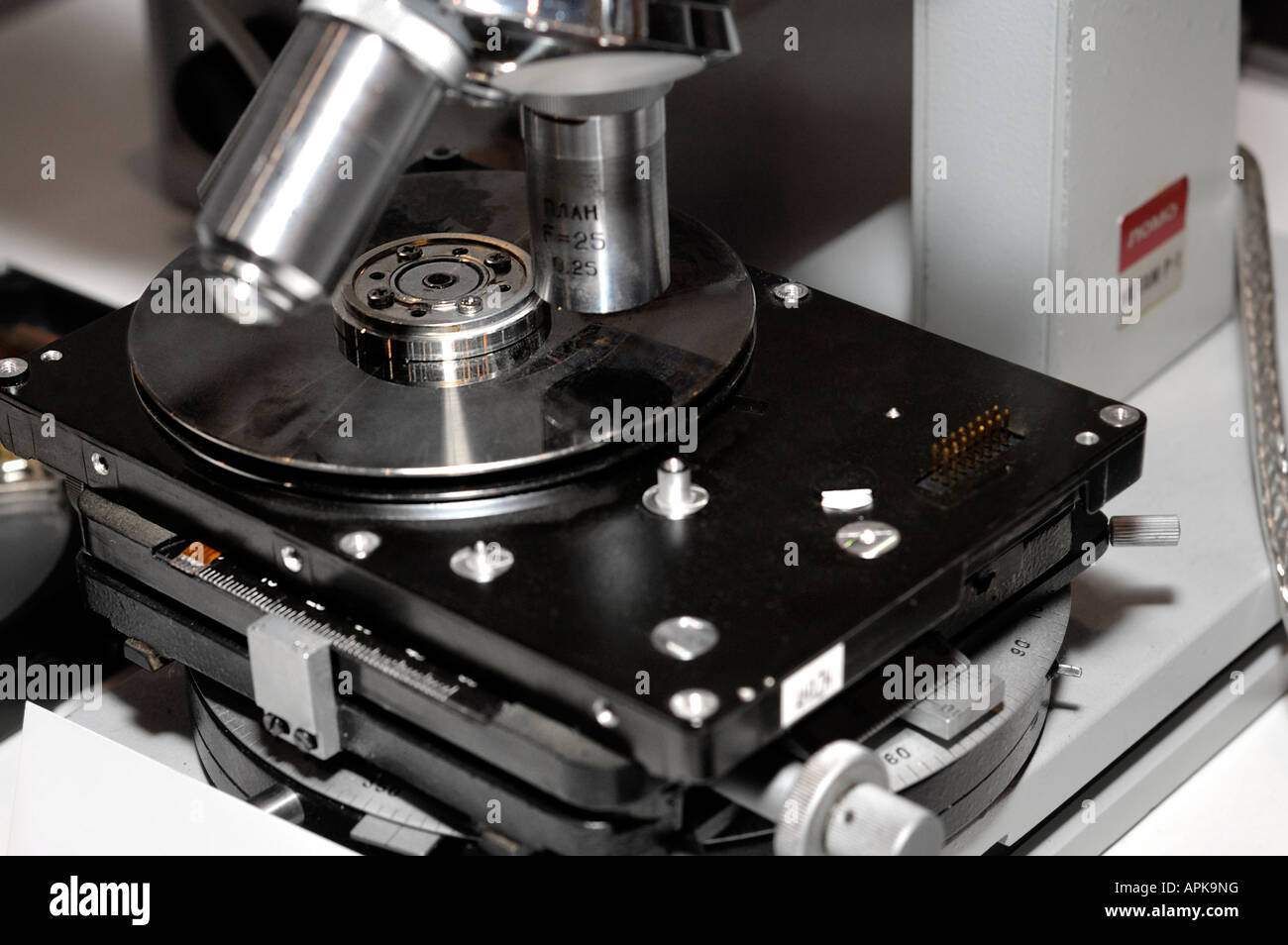 Hard disk drive under a microscope Stock Photo - Alamy