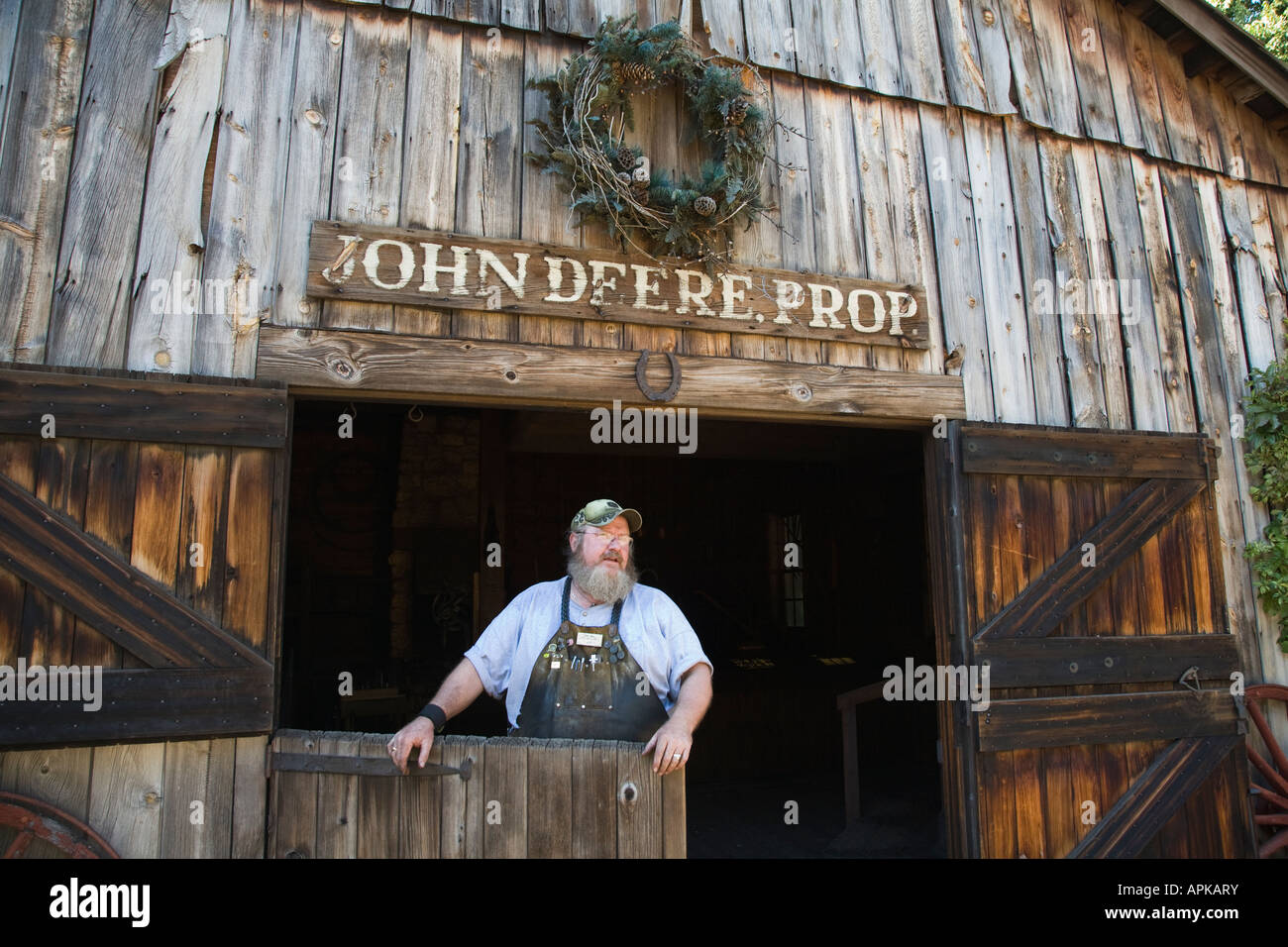 ILLINOIS Grand Detour Blacksmith stand in door of at John