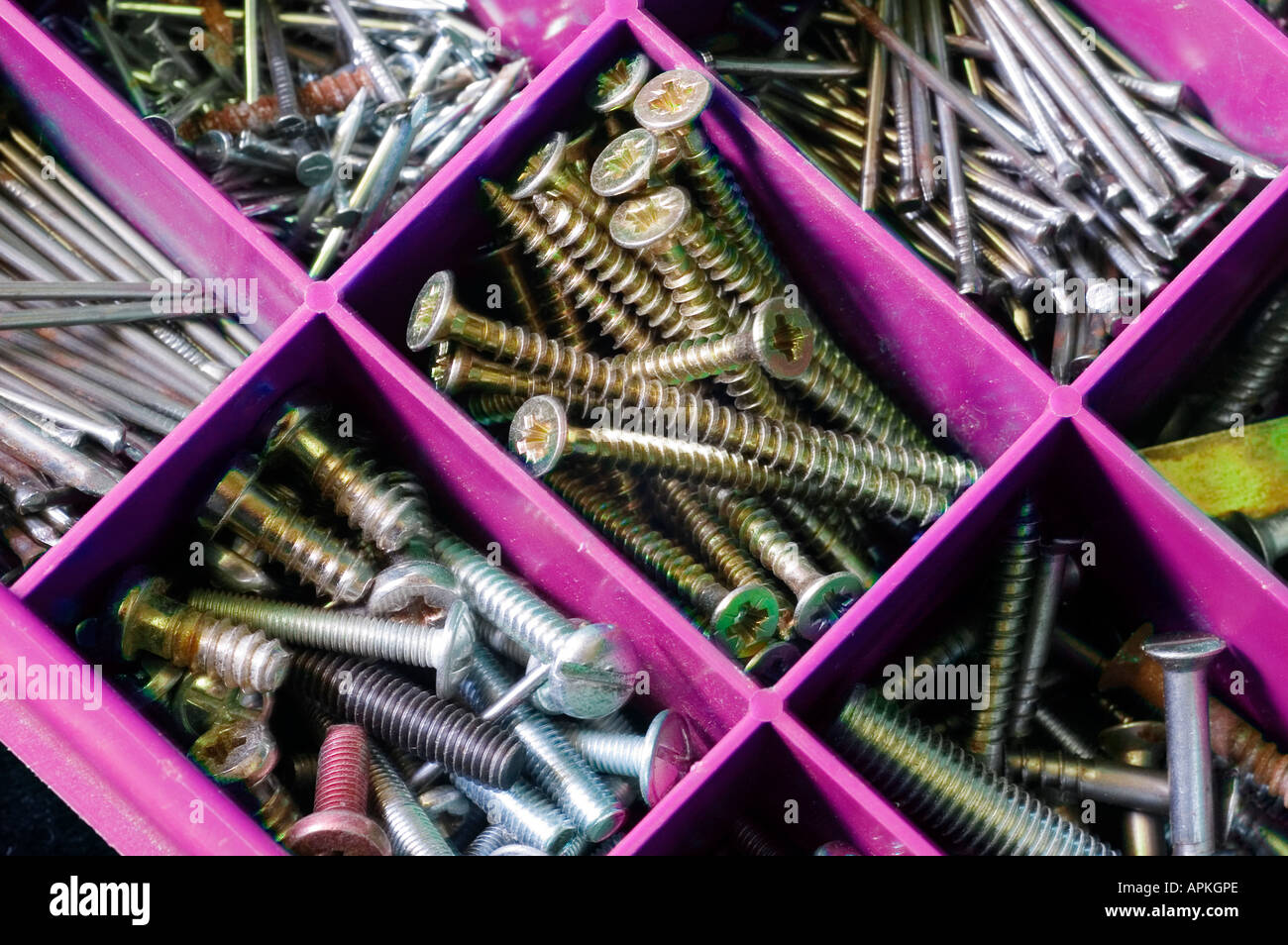 Nuts, bolts, screws and nails in box Stock Photo Alamy