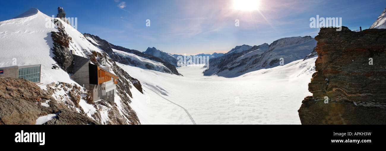Panoramic view of the Jungrfrau Top of Europe observatory and glacier, Jungfrau plateau Swiss Alps, Switzerland. Stock Photo