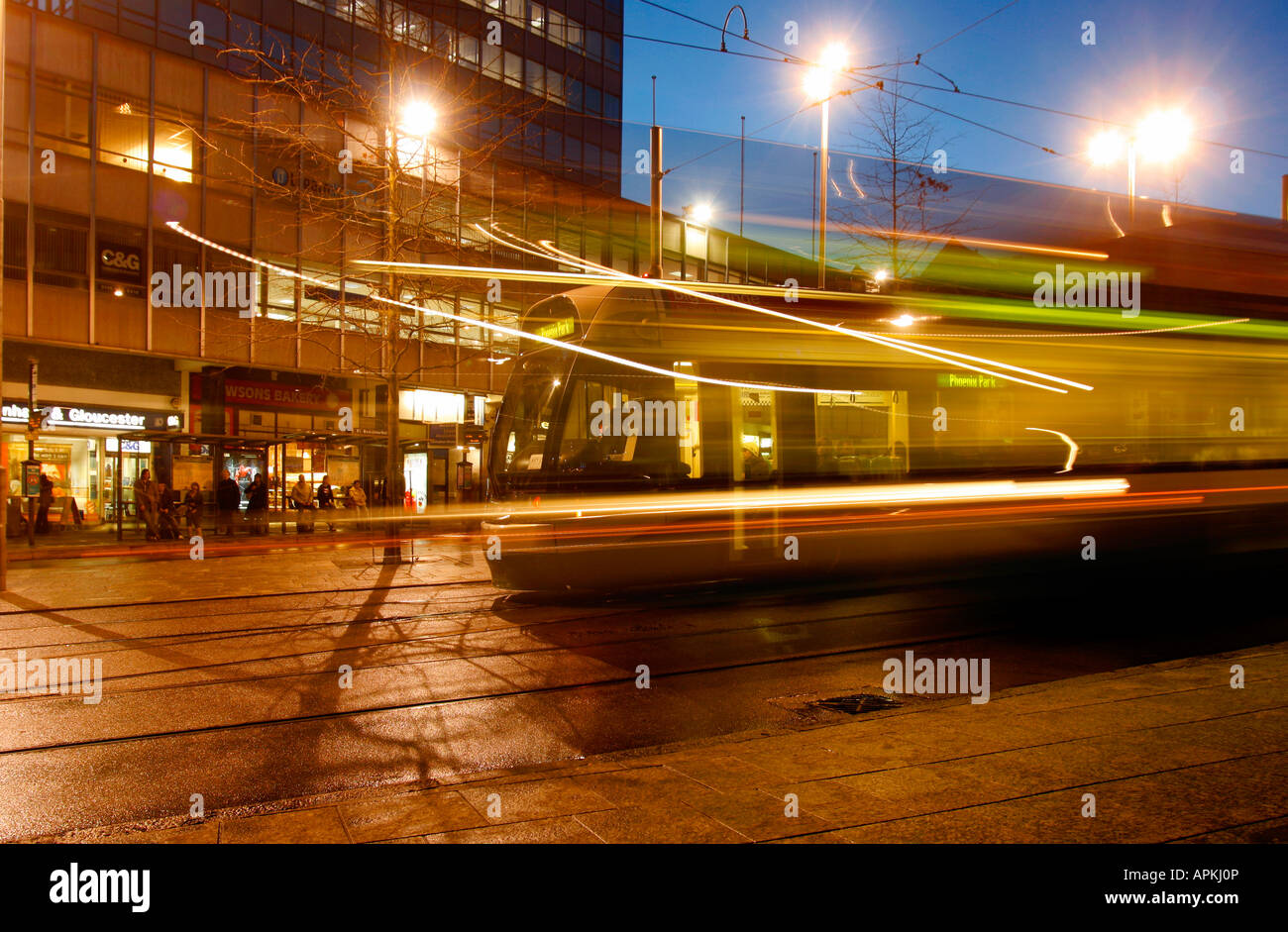 The blur of a Nottingham tram at Nighttime in Nottinghams Market