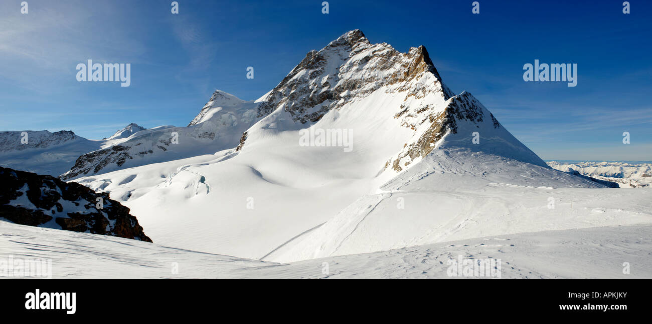 Panoramic view of the Jungrfrau peak from Top of Europe observatory, Jungfrau plateau Swiss Alps, Switzerland. Stock Photo