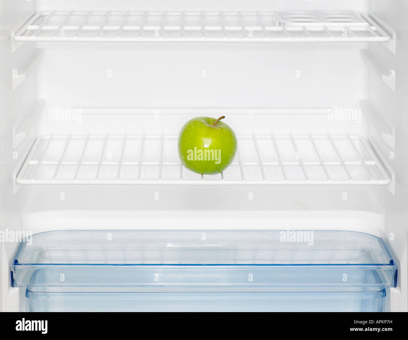Green apple in fridge (closeup Stock Photo Alamy