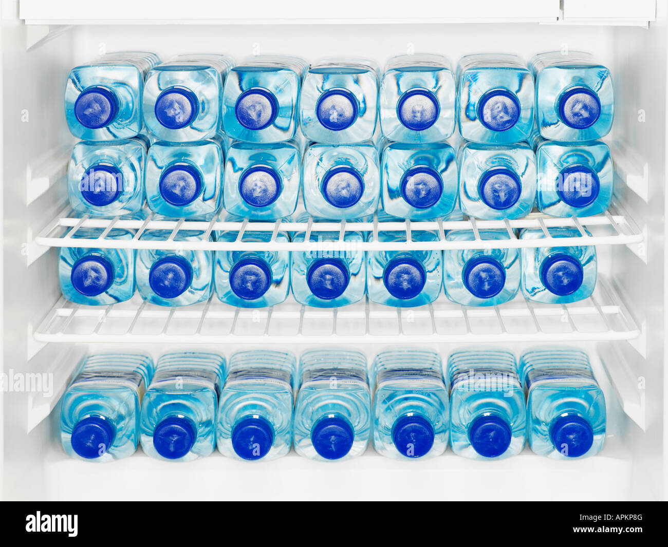 Water bottles in fridge Stock Photo Alamy