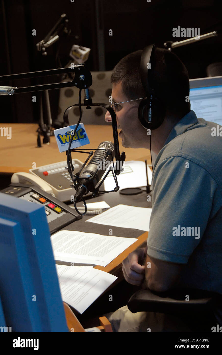Radio personality gives news weather sports talk and music as a form of entertainment and communication with people Stock Photo
