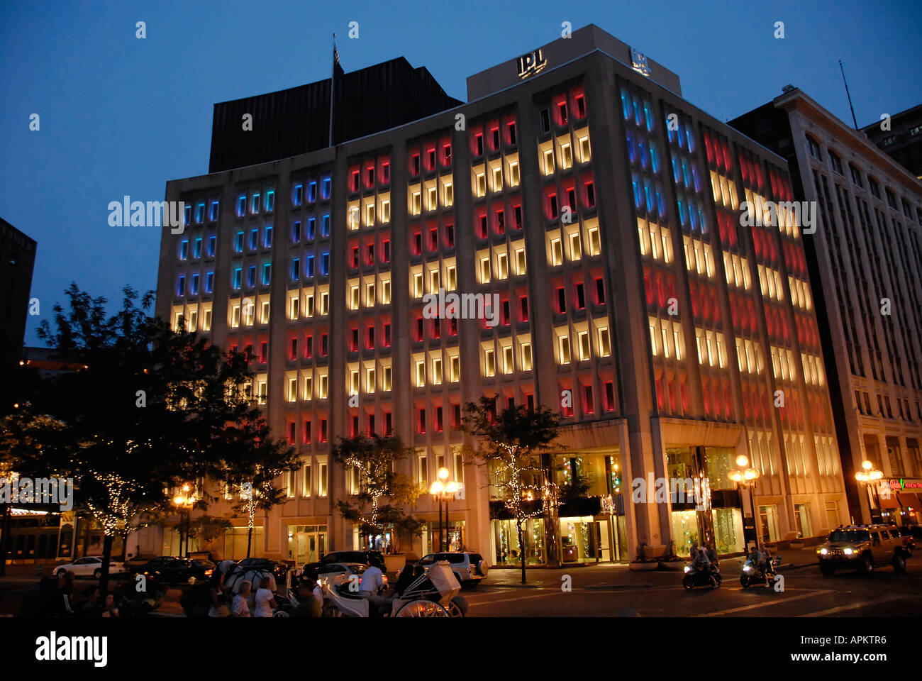 lights in windows at night form a replica of the United States Flag