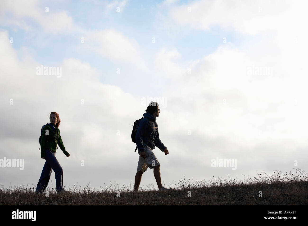 Full side view woman hiking hi-res stock photography and images - Alamy
