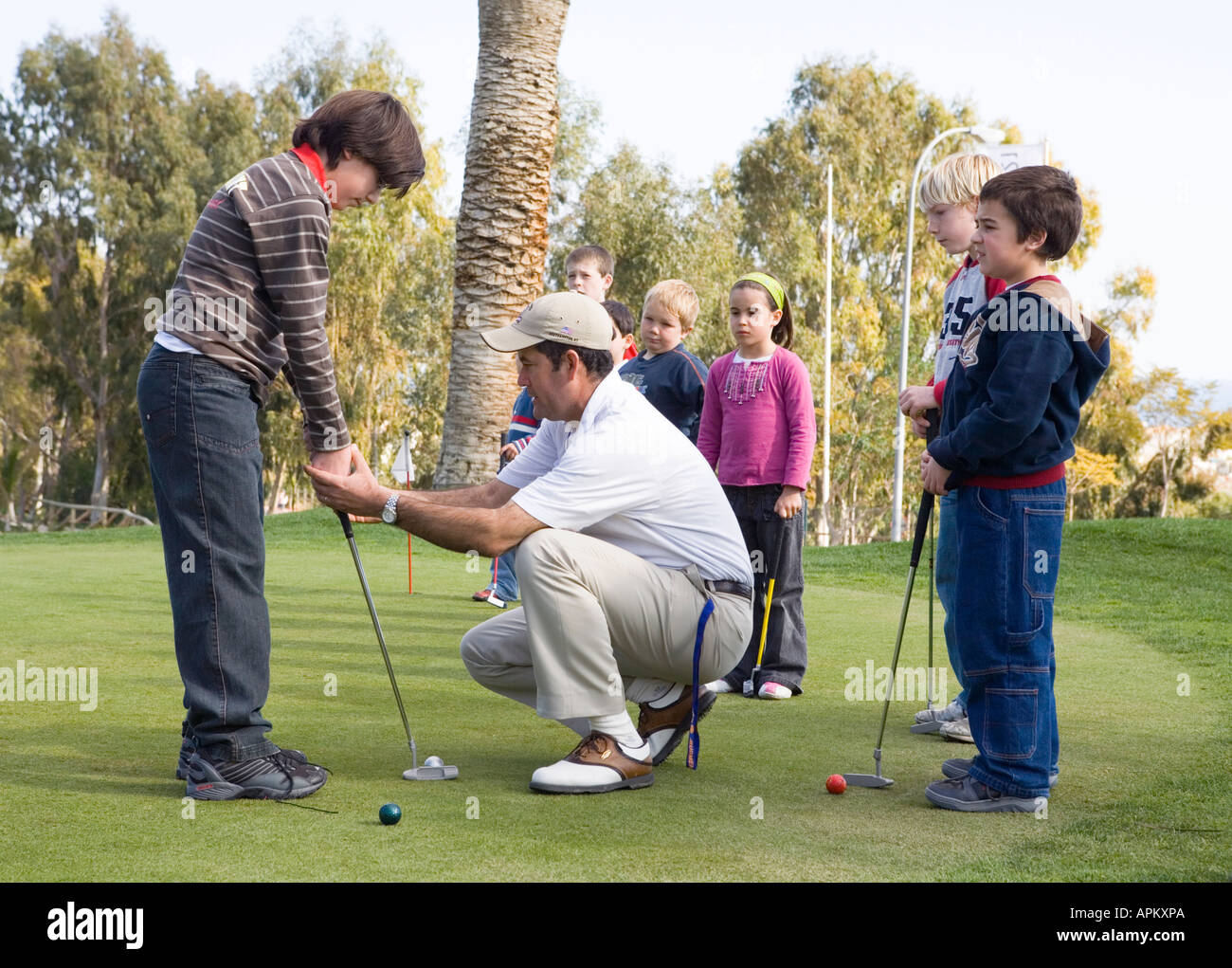 Golf pro training children EDITORIAL ONLY Stock Photo Alamy