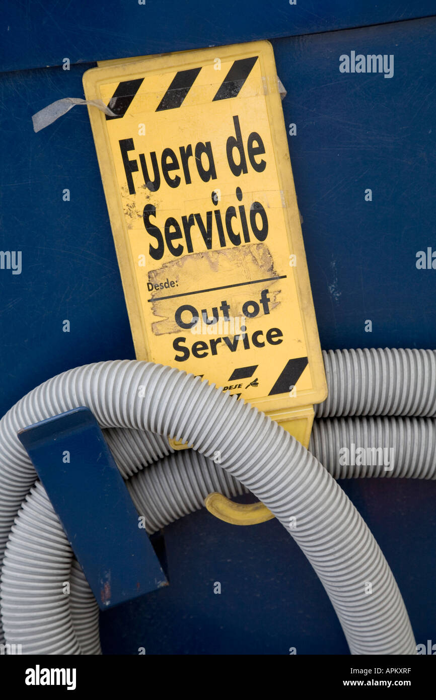 Sign in Spanish and English saying Out of Service Stock Photo Alamy