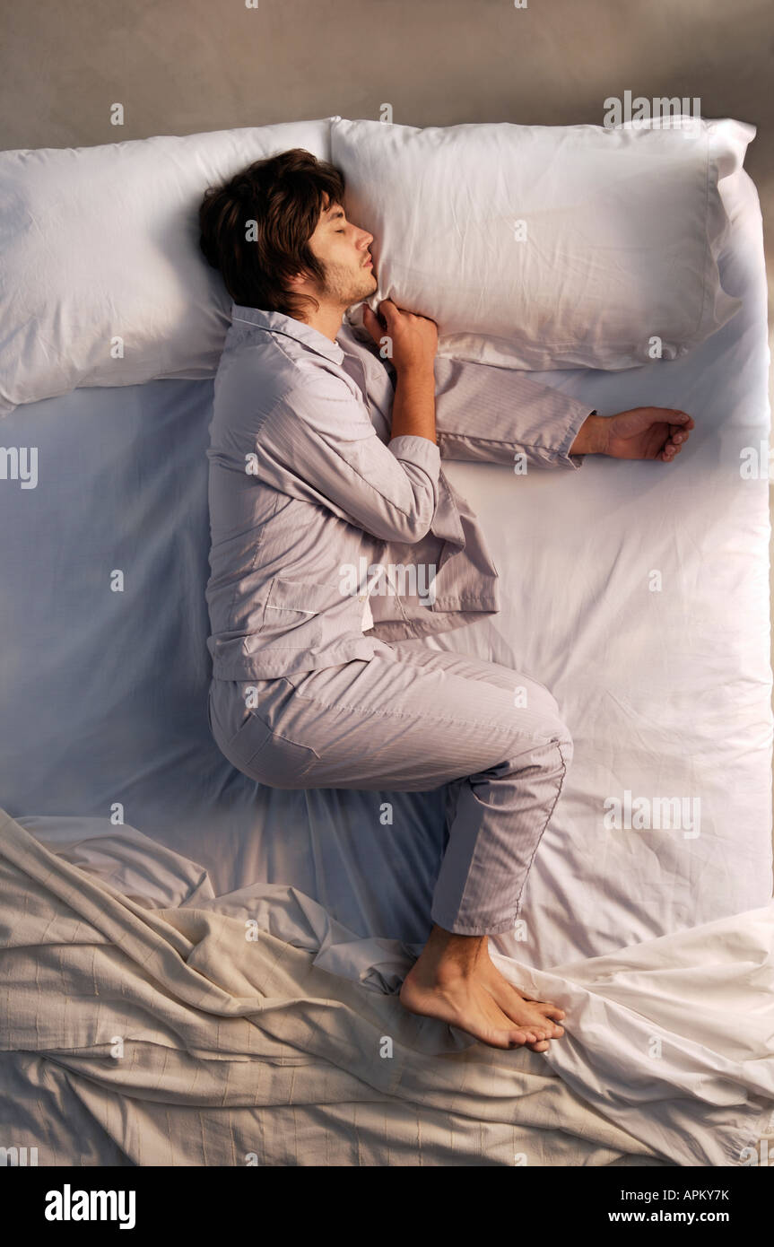 Man in bed Stock Photo Alamy