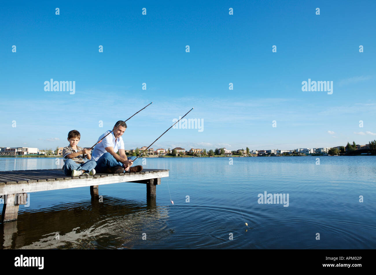 Father and son fishing Stock Photo