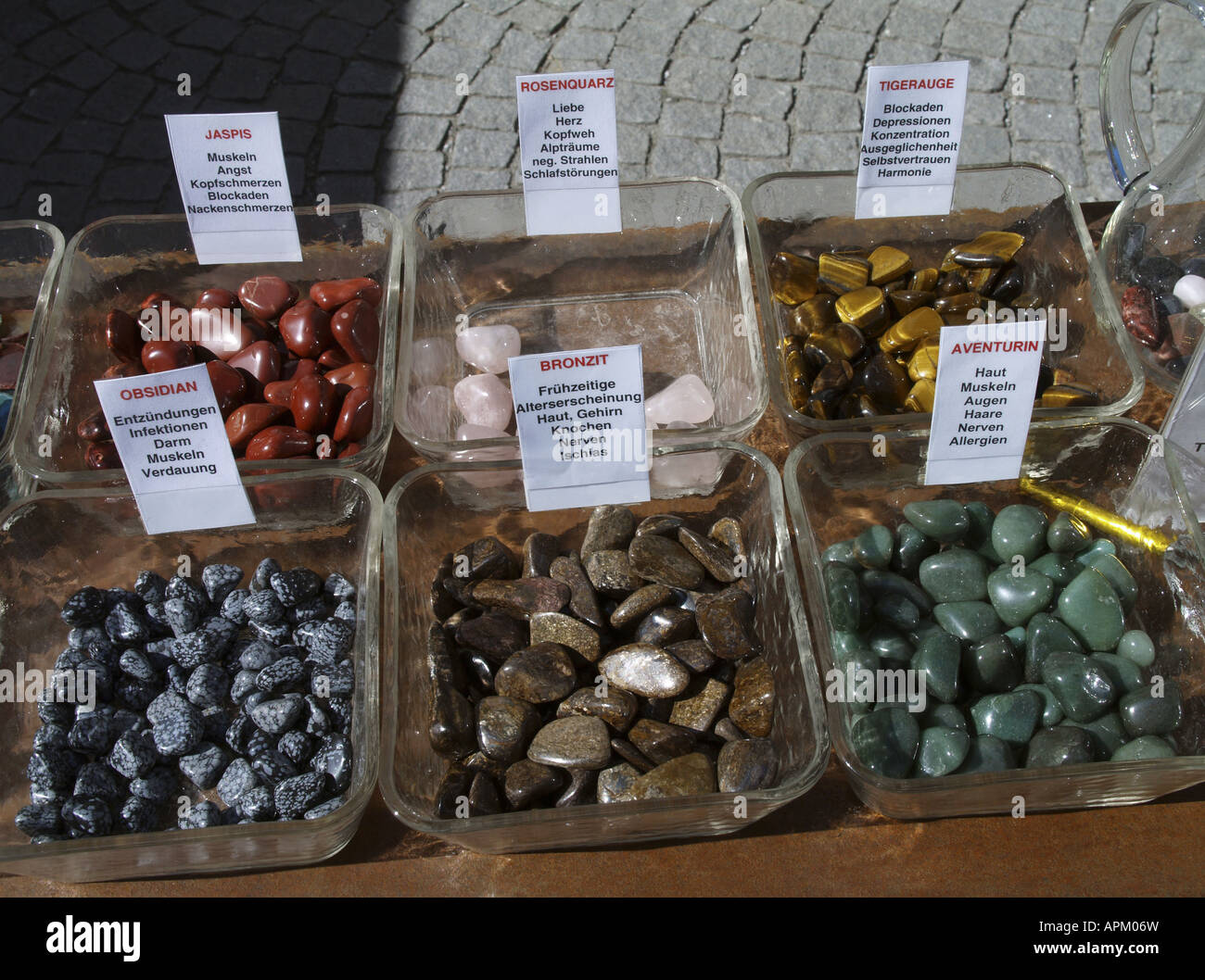 different minerals in glass bowls on a desk Stock Photo Alamy