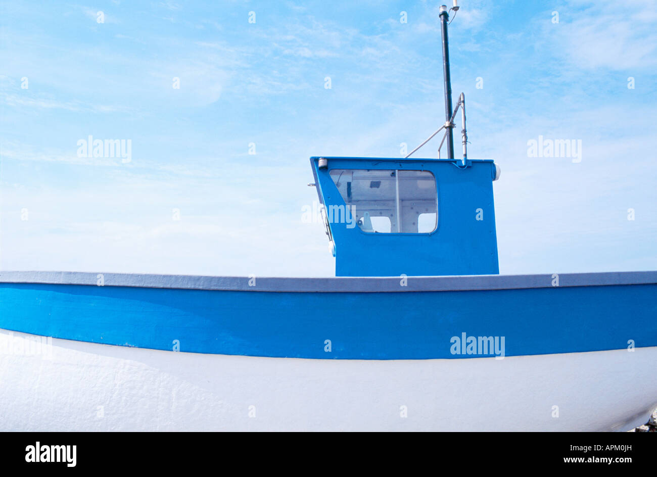 Blue and white fishing boat Stock Photo - Alamy