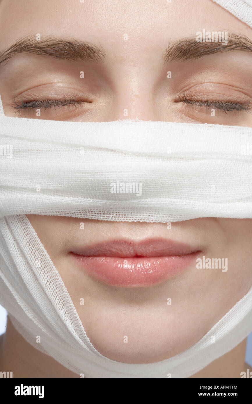 Bandage around woman's face, closeup Stock Photo Alamy