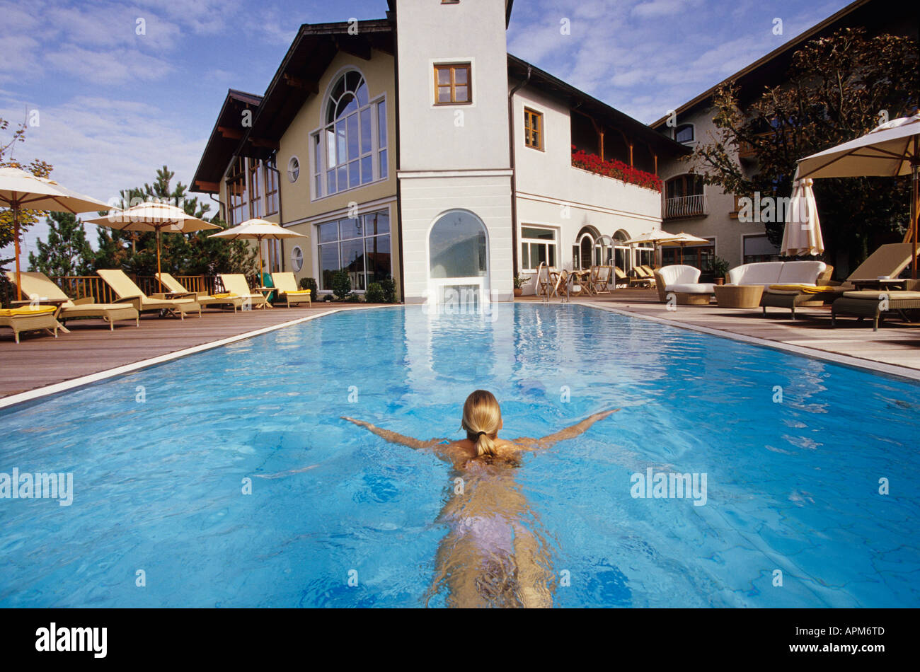 Woman in swimming pool Stock Photo - Alamy