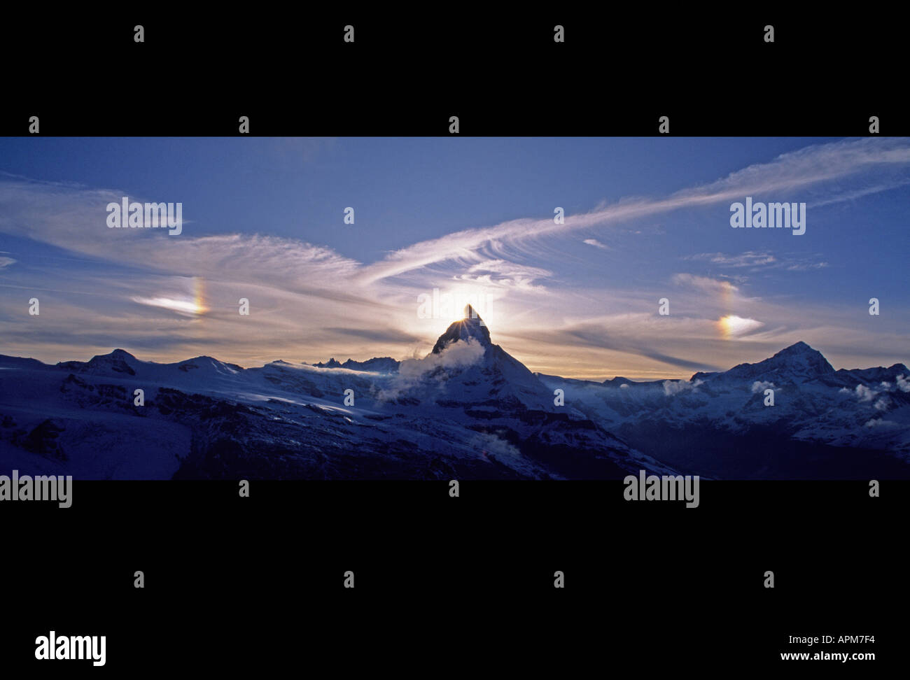 SUNDOGS or PARHELIA around MATTERHORN at sunset Alps ZERMATT SWITZERLAND Stock Photo