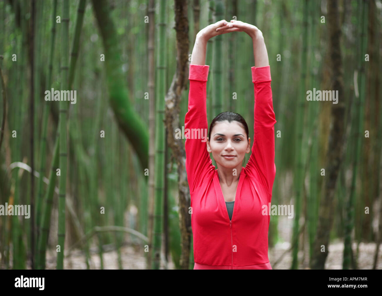 Sports woman stretching in nature hi-res stock photography and images ...