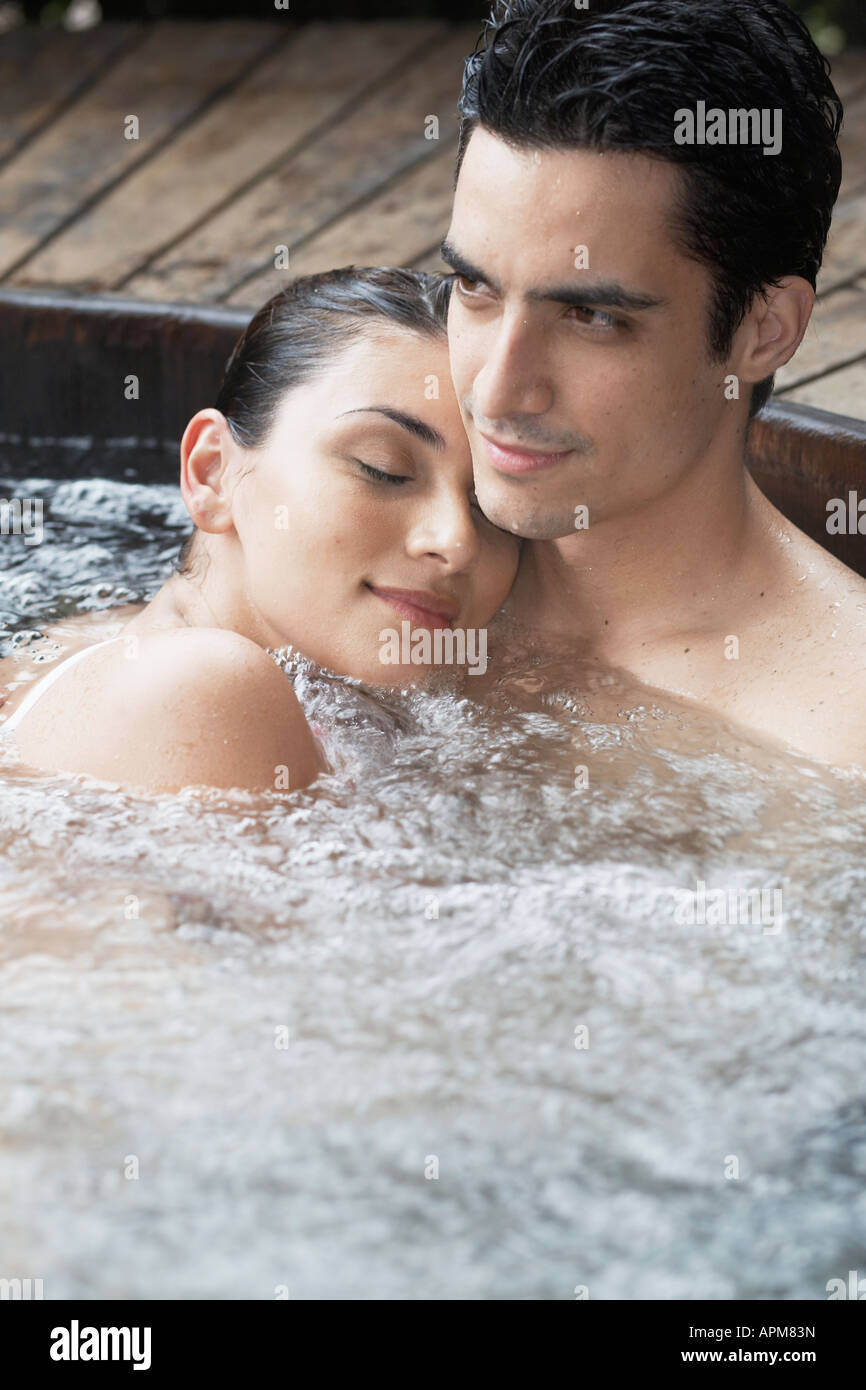 Young couple relaxing in Jacuzzi Stock Photo Alamy