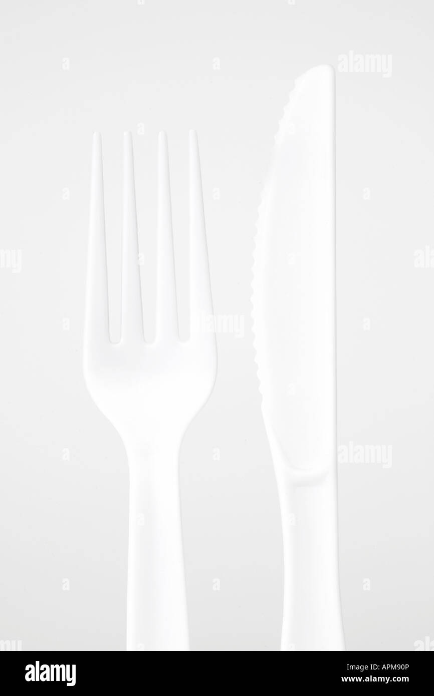 Plastic fork and knife (close-up) Stock Photo