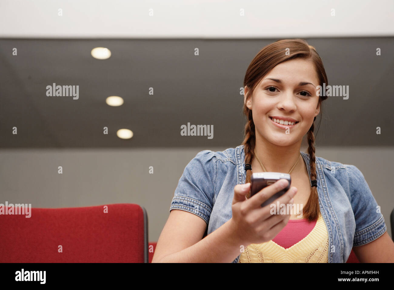 College student using PDA Stock Photo Alamy