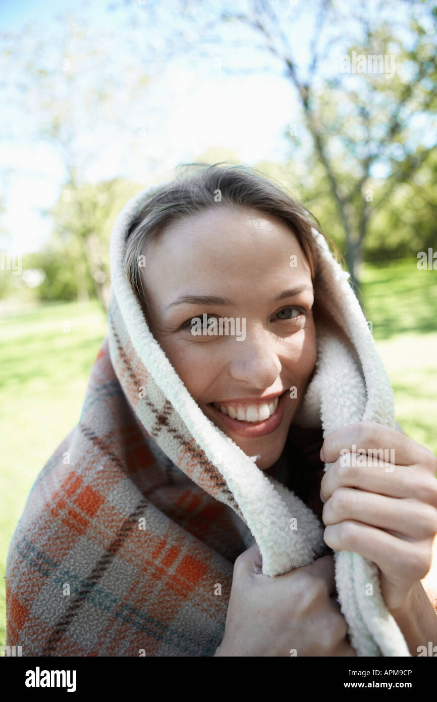 Young woman wrapped in a blanket (portrait Stock Photo Alamy