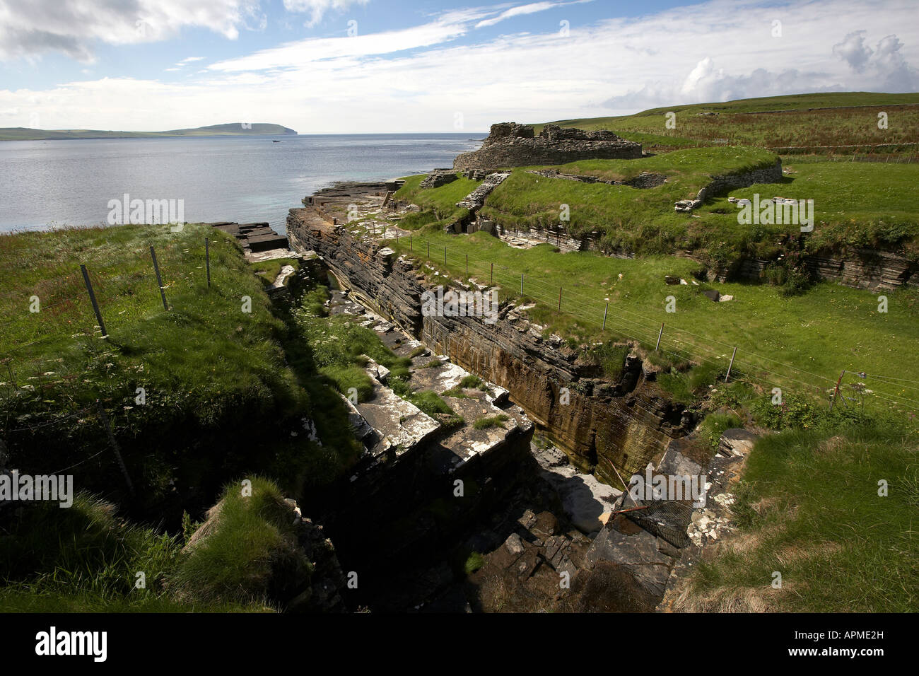 Geo and Midhowe Broch iron aged fortified stronghold facing Eynhallow Sound Rousay Isalnd Orkney Scotland UK Stock Photo