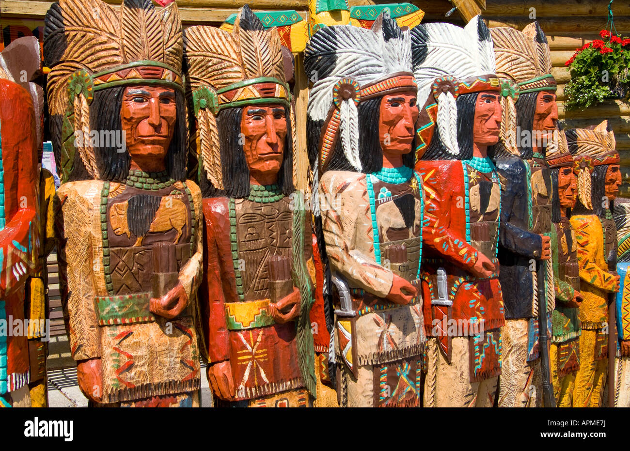 Old fashioned cigar store Indian totem pole statues in Jackson Hole Wyoming USA Stock Photo