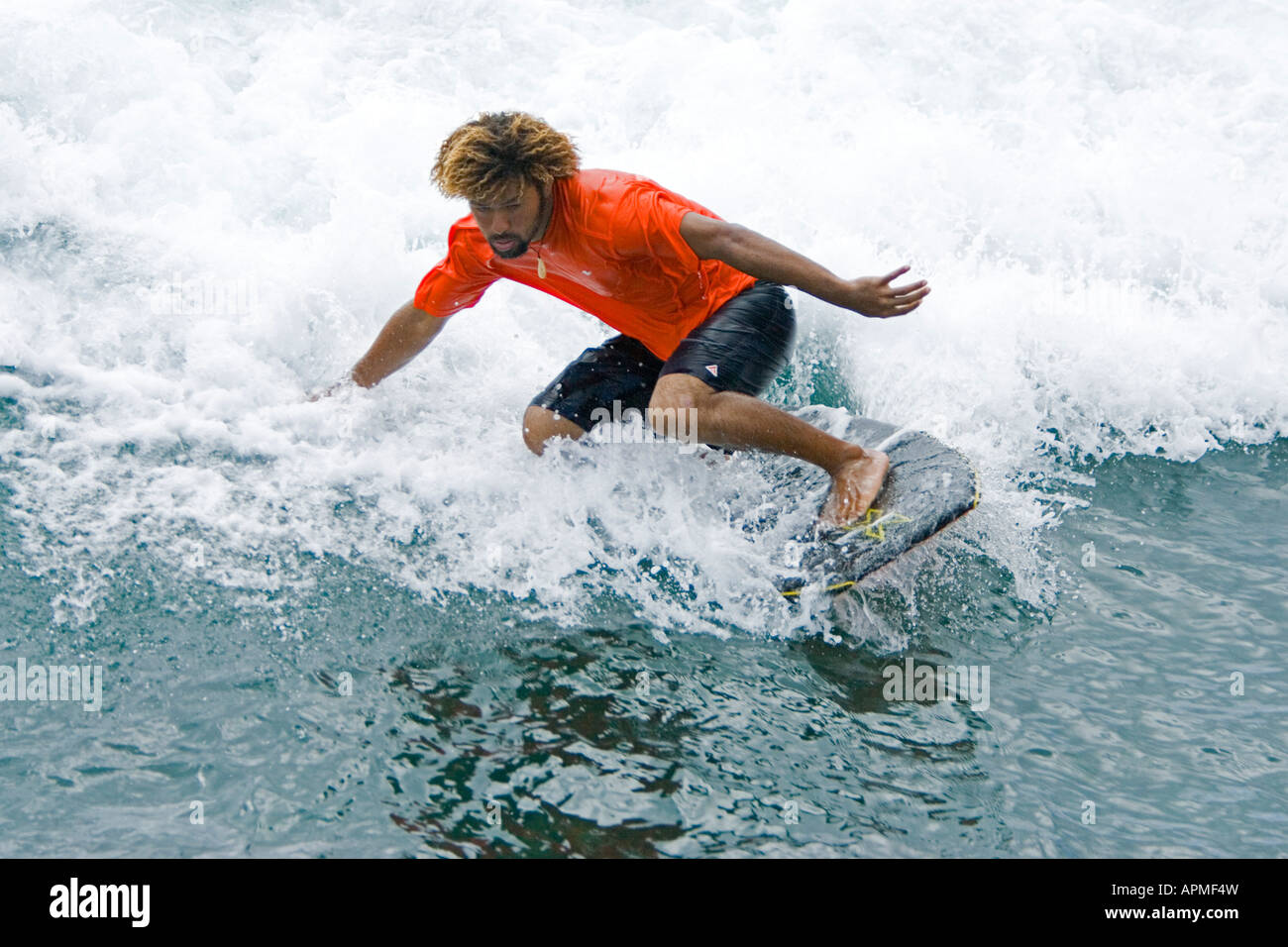 Wave Rideers Hawaiian wave rider hi-res stock photography and images - Alamy