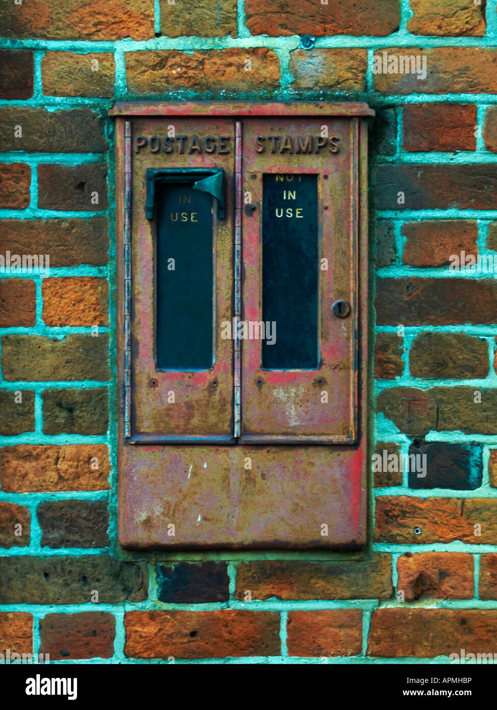 Disused postage stamp machine hi-res stock photography and images - Alamy