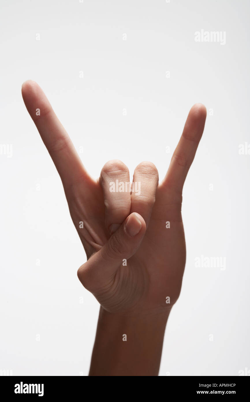 Woman's hand making 'Rock and Roll' sign (close-up Stock Photo - Alamy