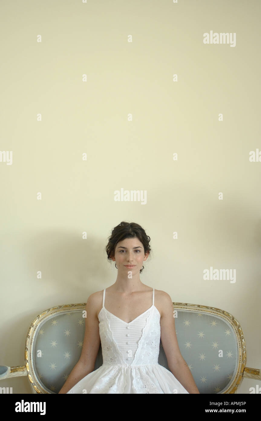 Woman dress sitting chair hi-res stock photography and images - Alamy
