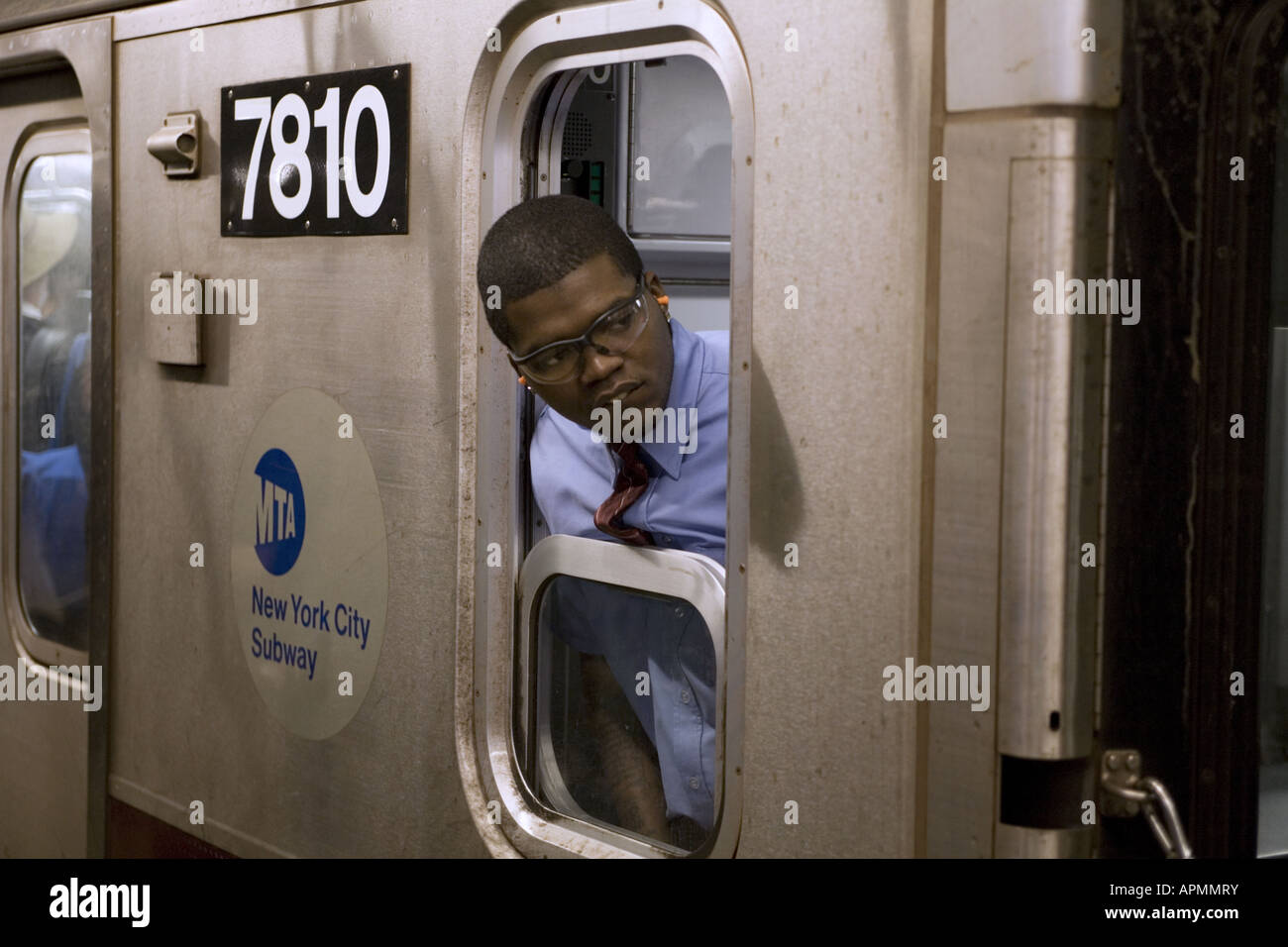 subway-train-conductor-checks-the-station-platform-before-train-leaves-the-station-new-york-city-subway-stock-photo-alamy